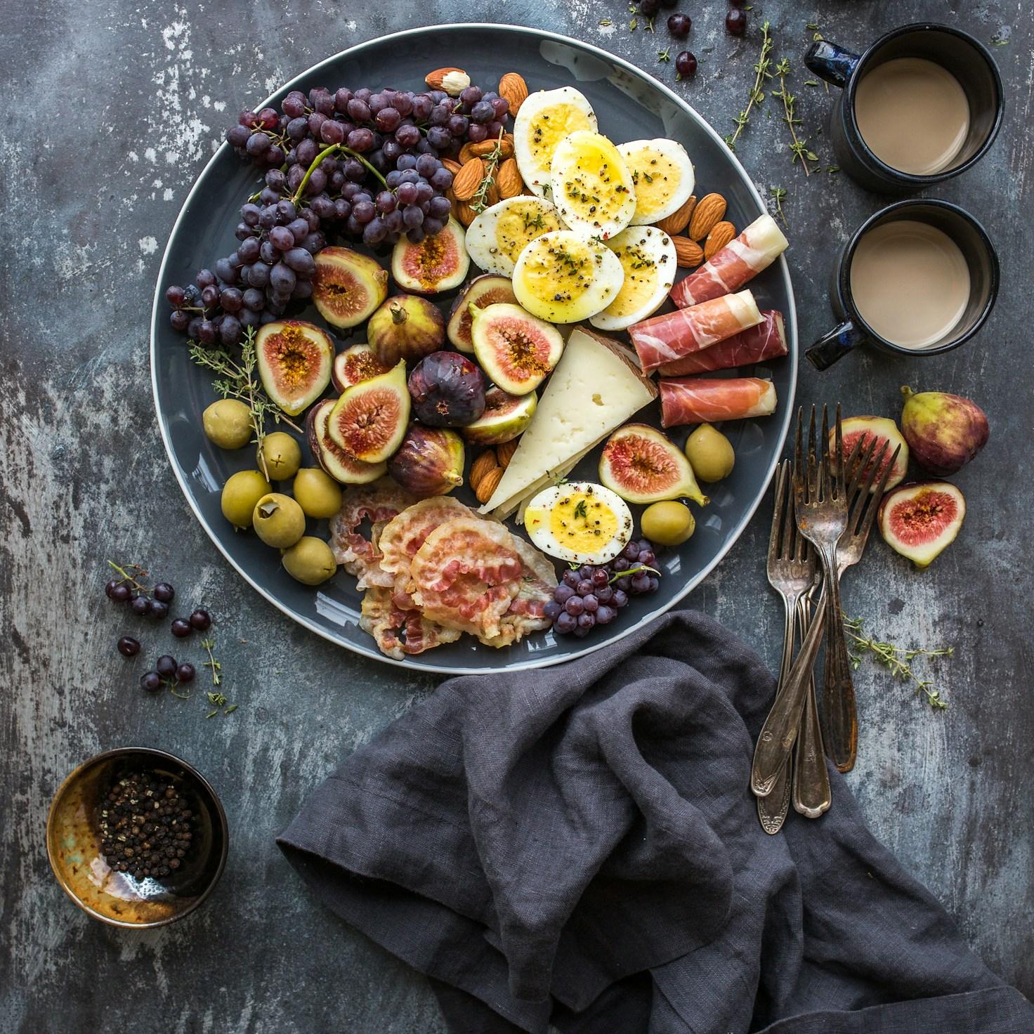 Community members collaborating in a modern kitchen space, sharing recipes and cooking techniques